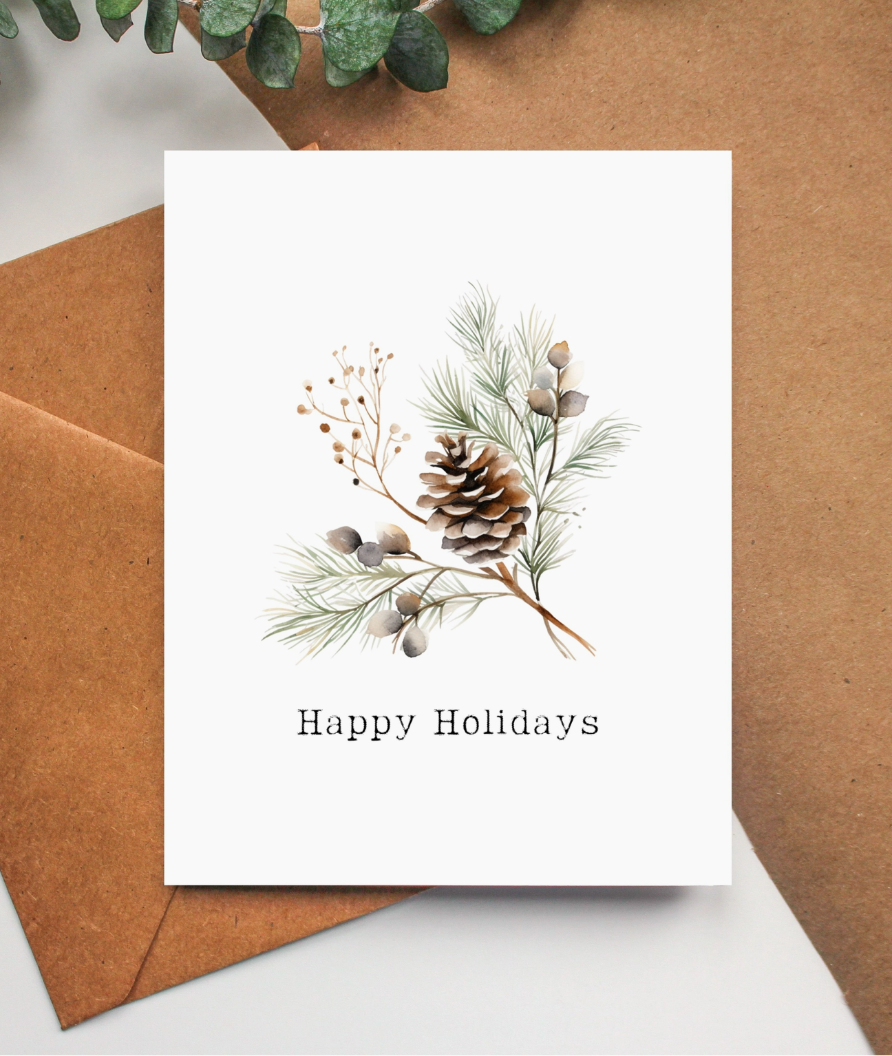 pinecone + greens "happy holidays" card